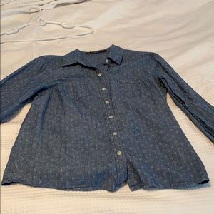A chambray shirt with faint white anchors.